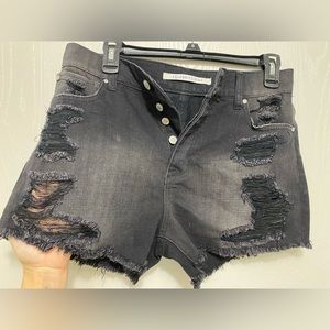 Button fly distressed denim shorts
